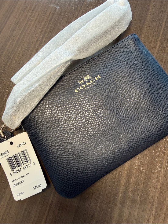 Coach Handbags - Coach Navy Pebbled Leather Coin Wristlet with Gold Logo